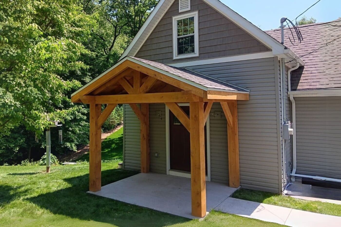 Timber frame porches in painesville attached to home