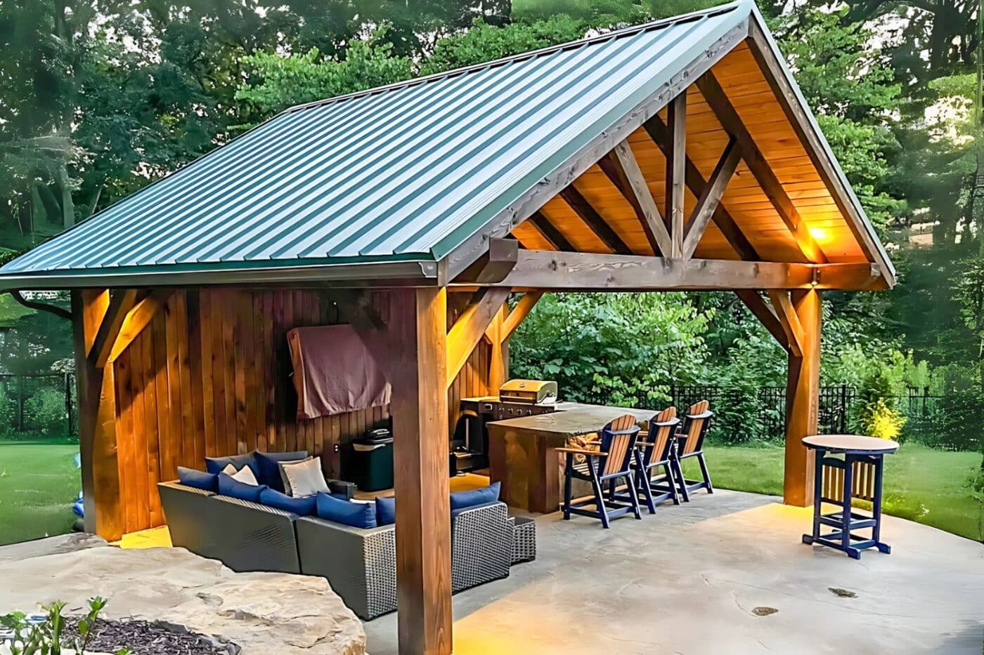 Timber Frame Pavilions in Painesville OH, Light wooden frame with light, metal roof, and protected seating area