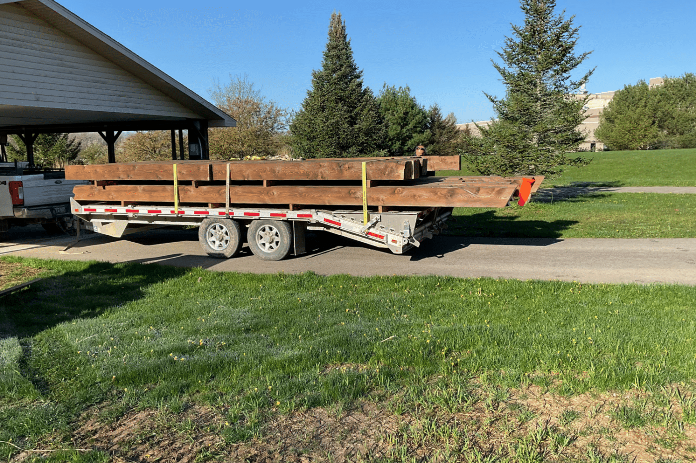 Commercial pavilion kit being transported on trailer