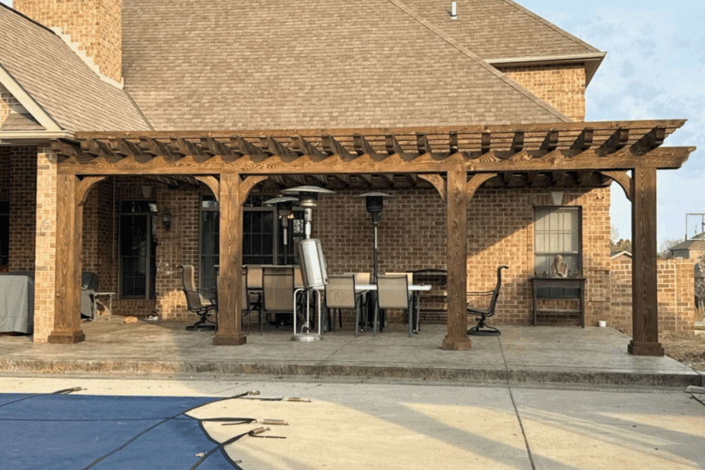 pergola near pool in backyard cost