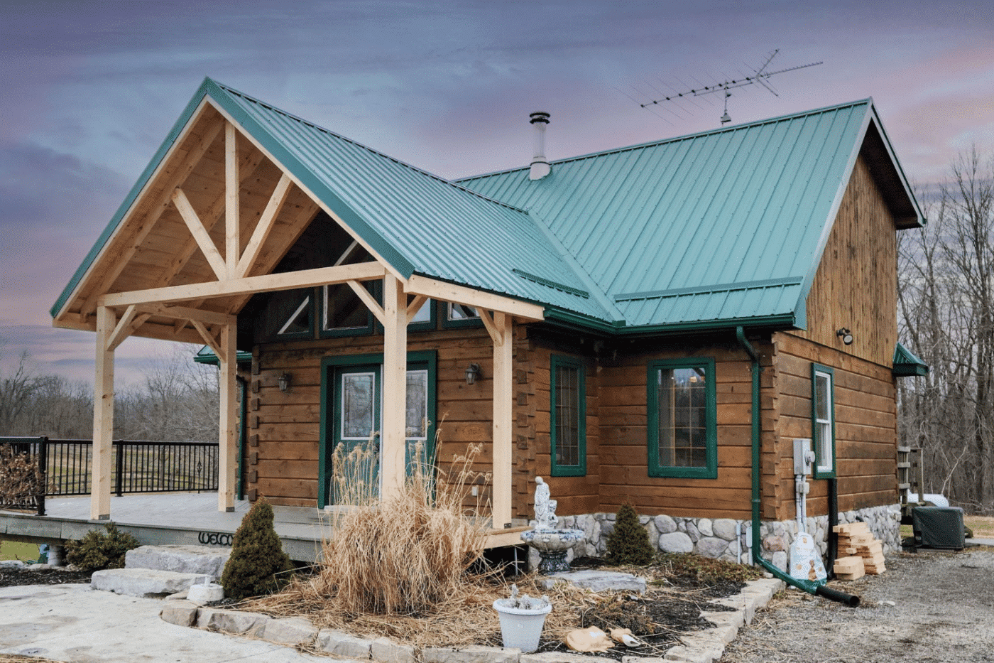 custom porch in lakewood ohio on a house with a green roof