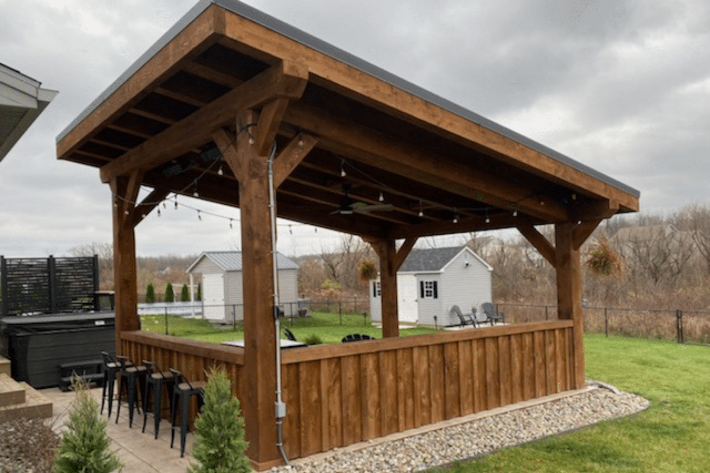 the evergreen lean to pavilion with chairs